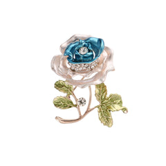 Vibrant red floral brooch on a white background