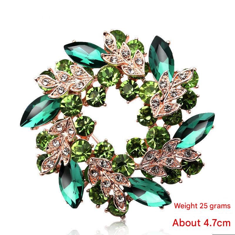 Floral brooch with electroplated finish