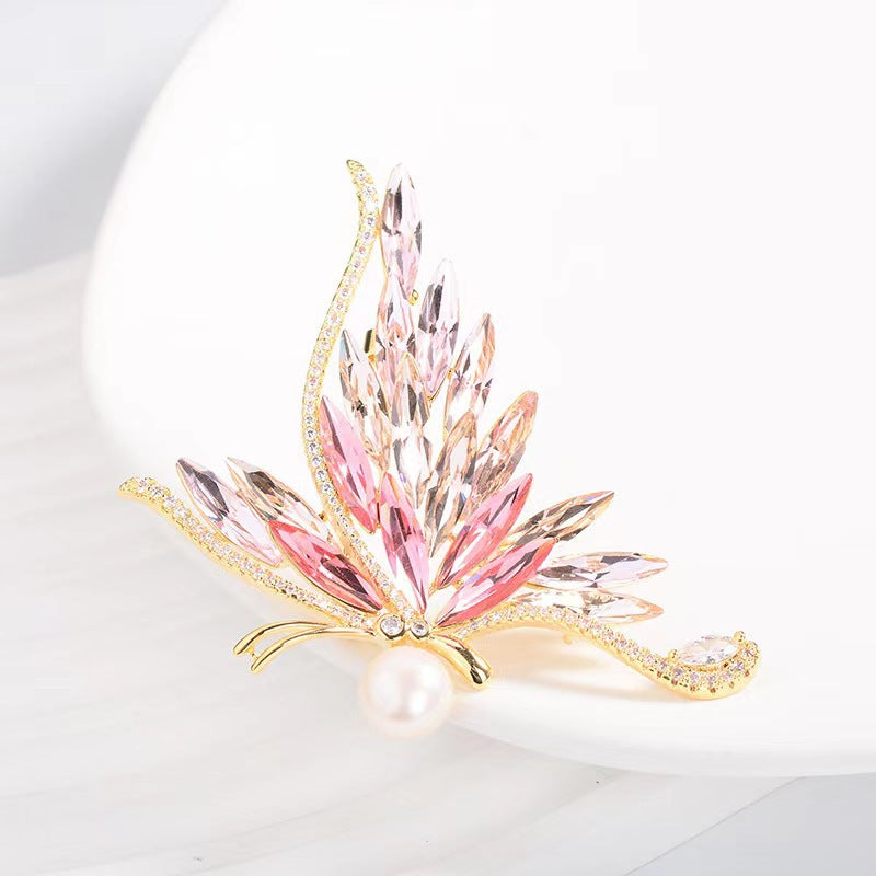 Elegant blue and pink butterfly brooch close up