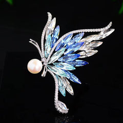 Stylish butterfly pin on a light fabric background