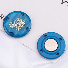 Close-up view of strong magnetic snaps for garments