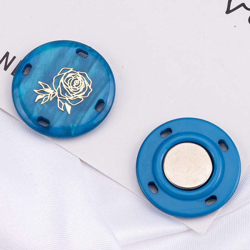 Close-up view of strong magnetic snaps for garments