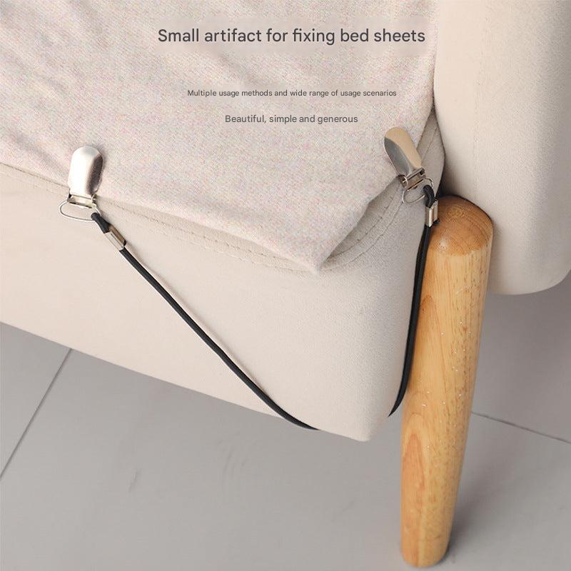 metal elastic clamp securing a sofa cover