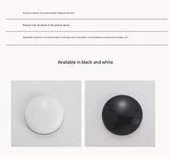 Magnetic weights on a table outdoors