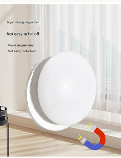 Magnetic hooks securing patterned tablecloth