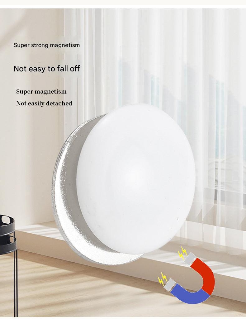Magnetic hooks securing patterned tablecloth
