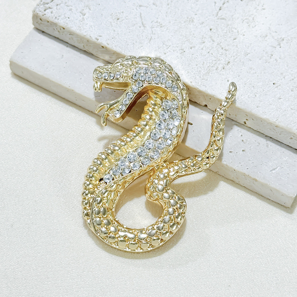 Creative Brooch Design on White Background