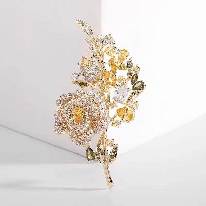 Alloy brooch with rhinestone embellishments