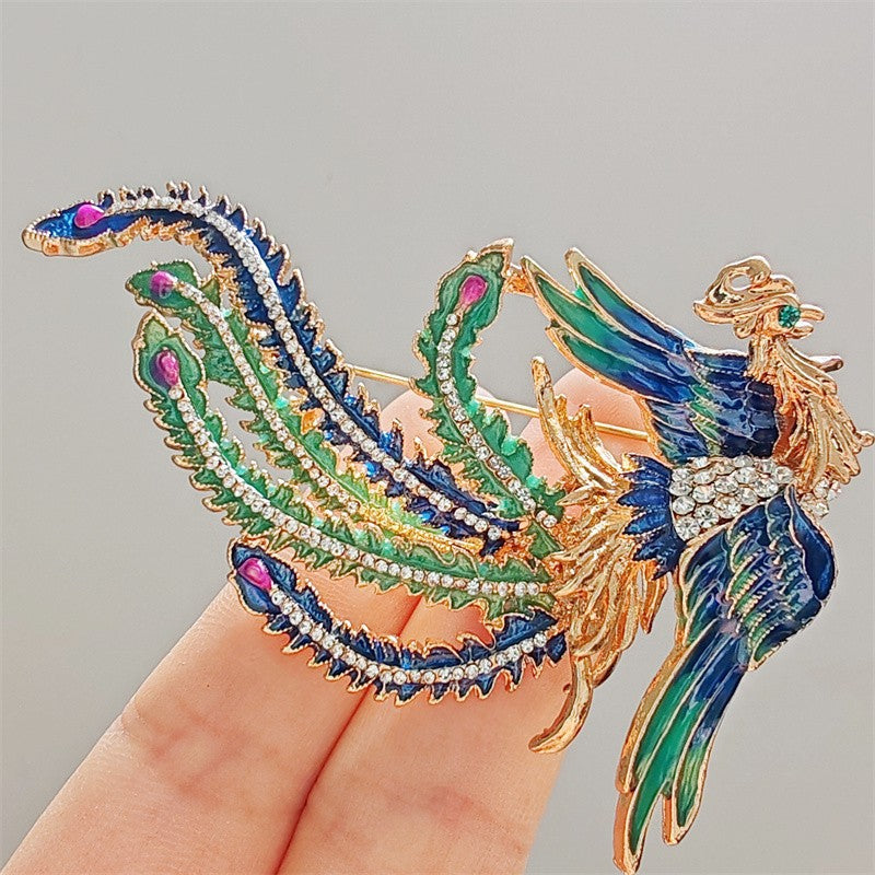 Close-up of beautiful phoenix design brooch