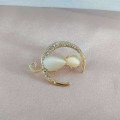 Elegant animal inspired brooch in bright light