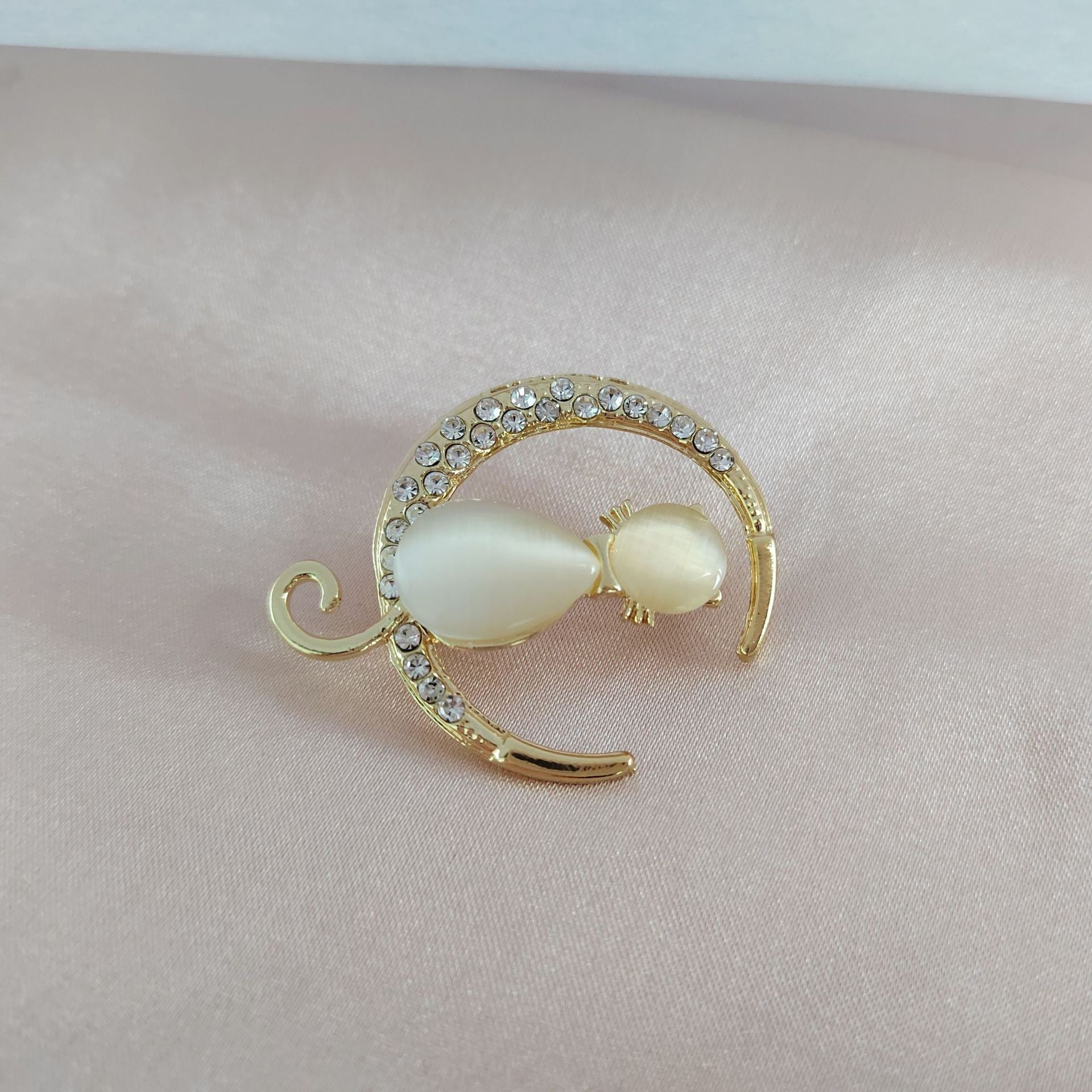 Elegant animal inspired brooch in bright light