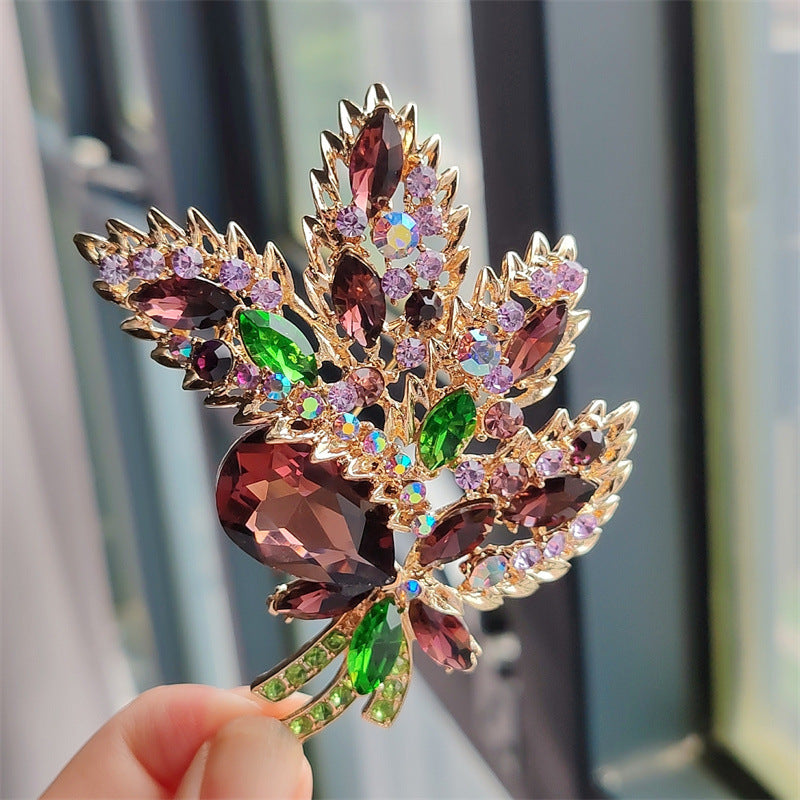 Close up of crystal floral brooch detail