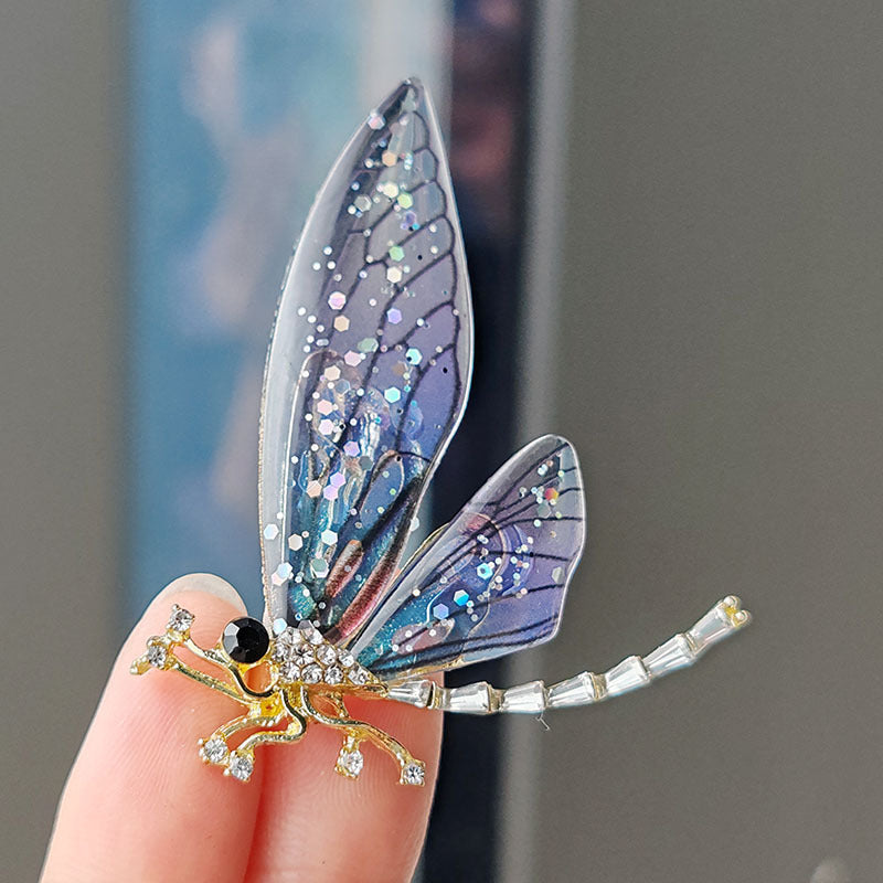 Stylish way to wear a colourful dragonfly brooch