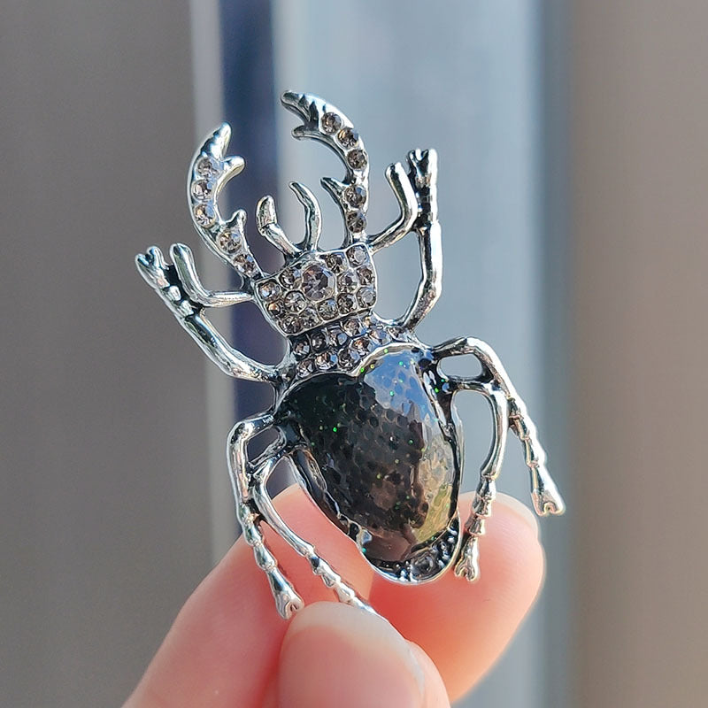 Close-up of the Vintage Beetle Brooch in black