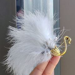 Elegant white swan brooch with pearl details