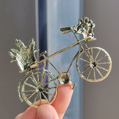 Rhinestone bicycle brooch on a fashionably dressed model