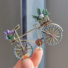 Decorative bicycle brooch in elegant packaging