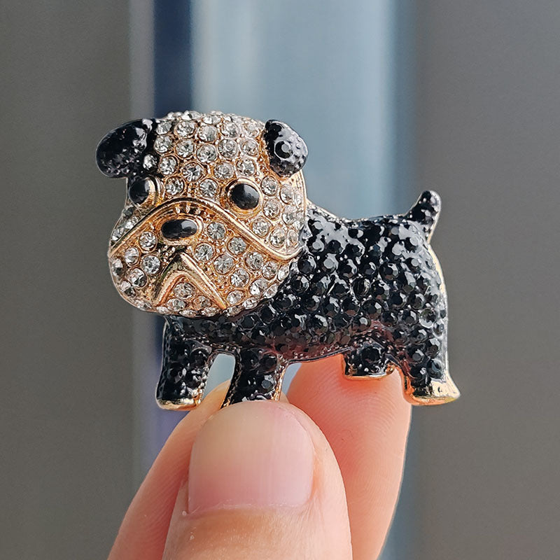 Close-up of the dog-themed brooch