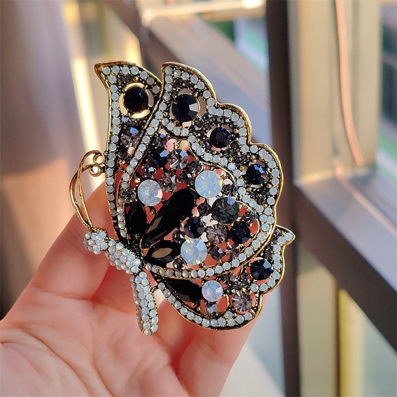 Close-up of a stylish butterfly brooch