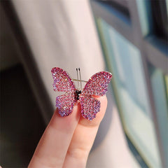 Close-up of the unique butterfly design on the brooch
