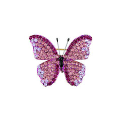 Rhinestone butterfly brooch on a coat