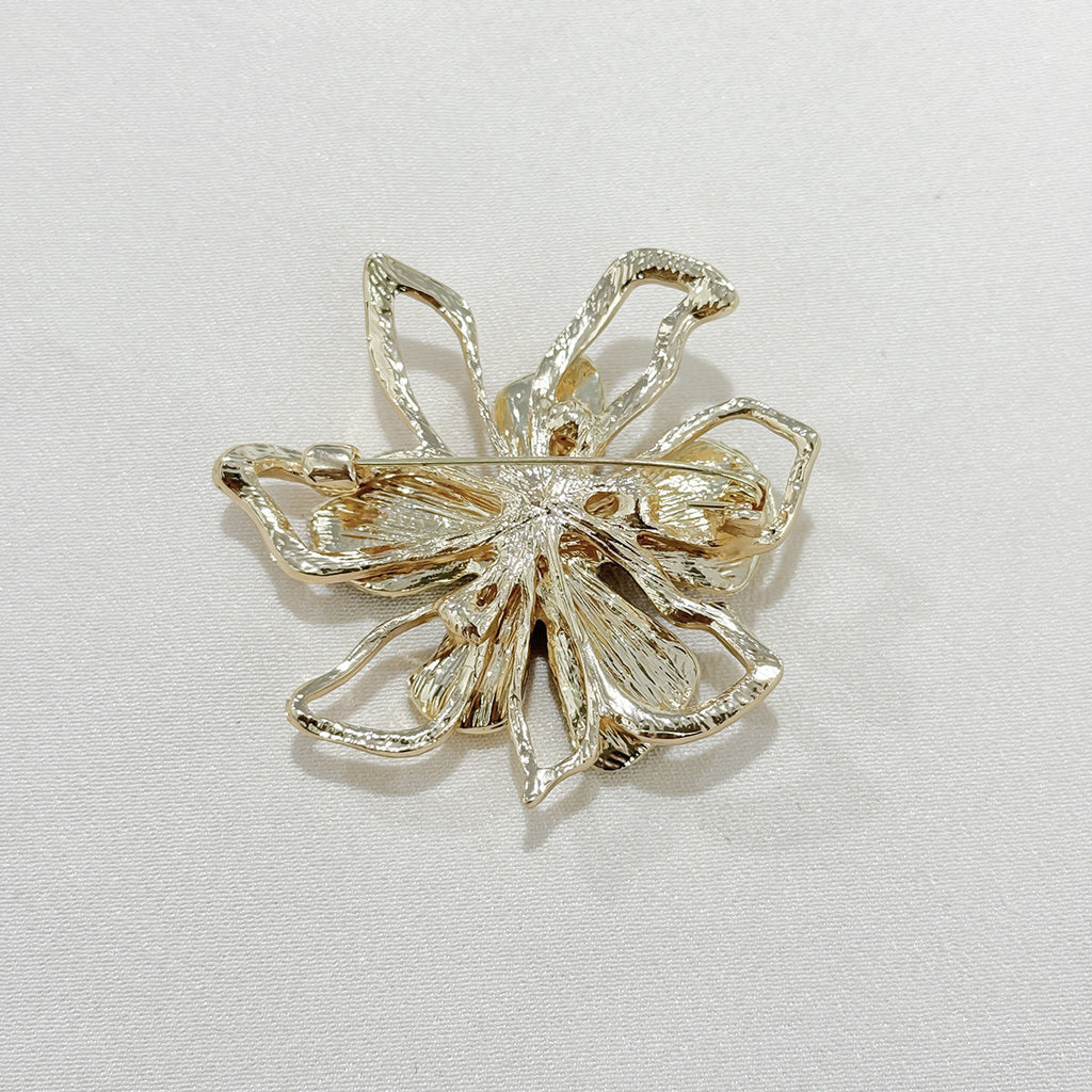Close-up of rhinestone detail on brooch