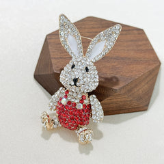stylish rhinestone brooch on fabric