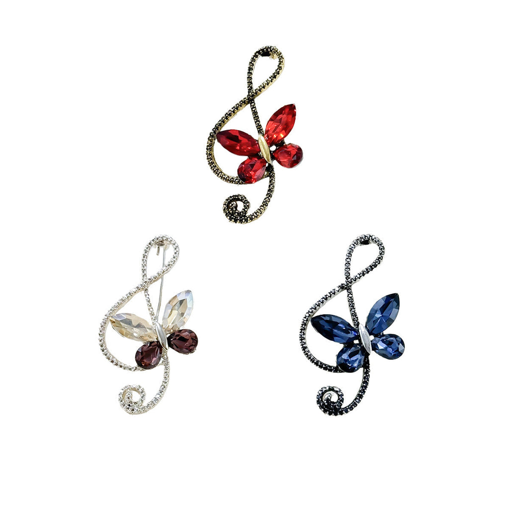 Vintage style brooch presented on a dark jacket