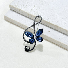 Lifestyle image of the butterfly brooch on display