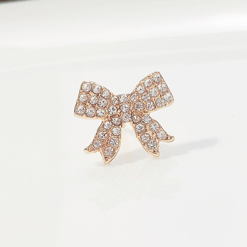 Elegant Clover Cat Eye Brooch Pin on fabric