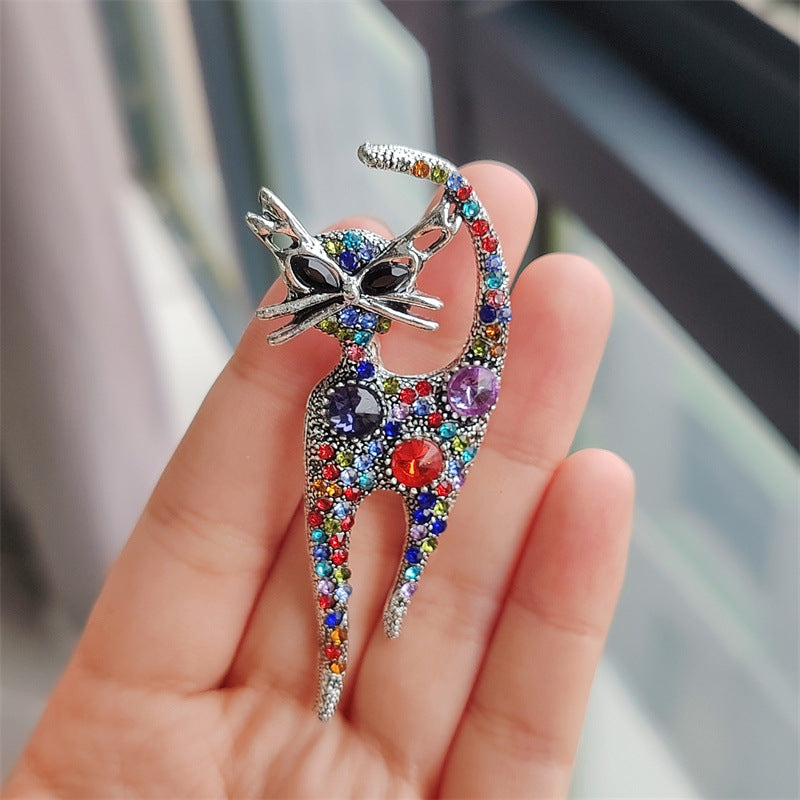 Multicolour decorative cat brooch display