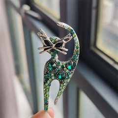 Stylish champagne cat pin adorned with sparkles