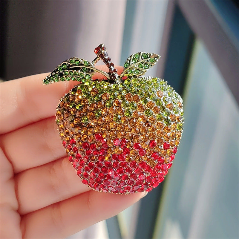 Beautiful retro avocado brooch displayed as an accessory