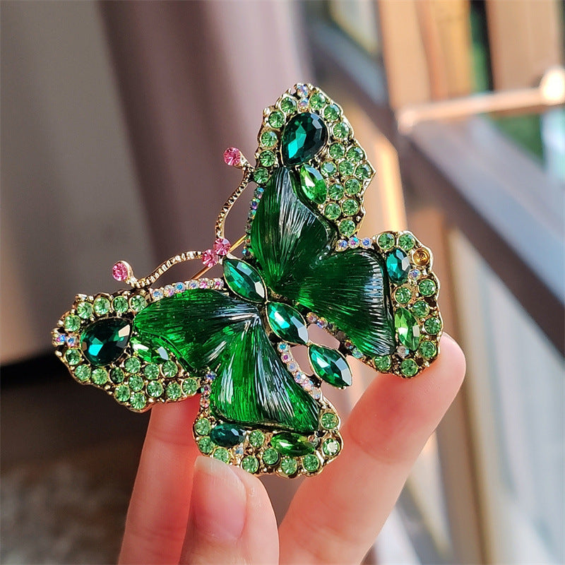 Elegant butterfly brooch on a scarf