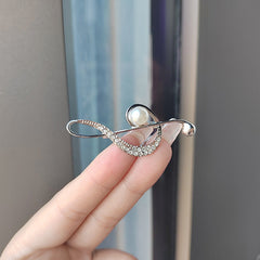 Multi-functional pin attached to a jacket
