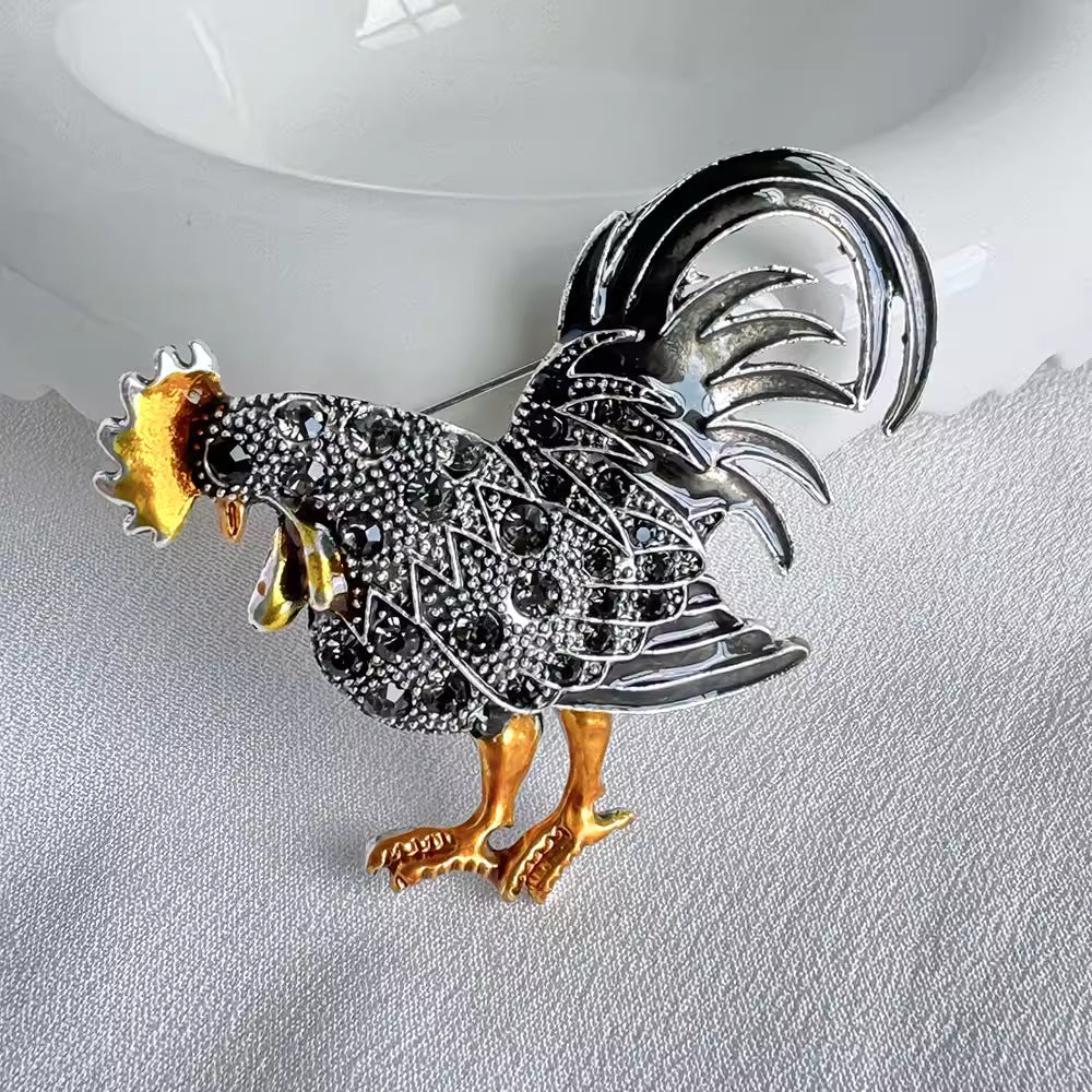 Side view of elegant grey rooster brooch design