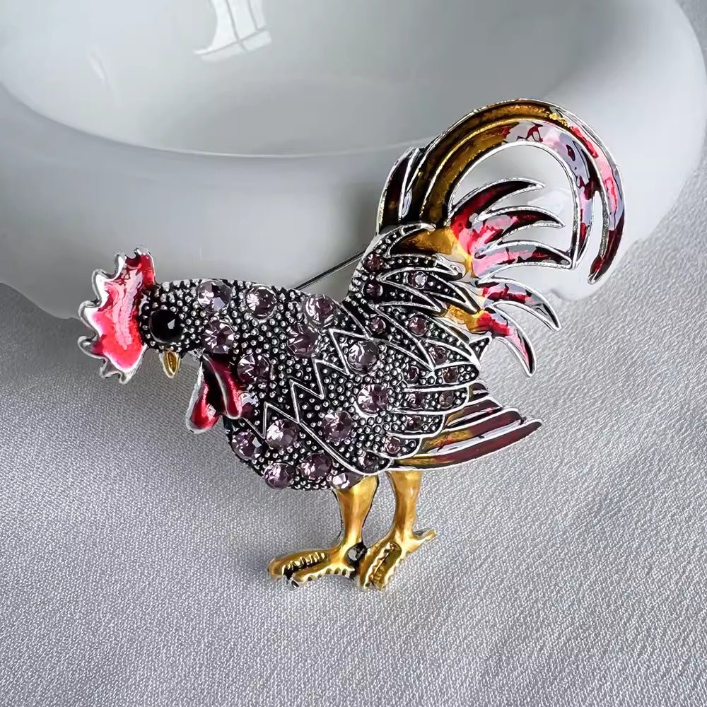 Front view of the charming rooster brooch