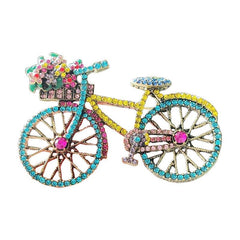Stylish colourful rhinestone bicycle brooch close-up