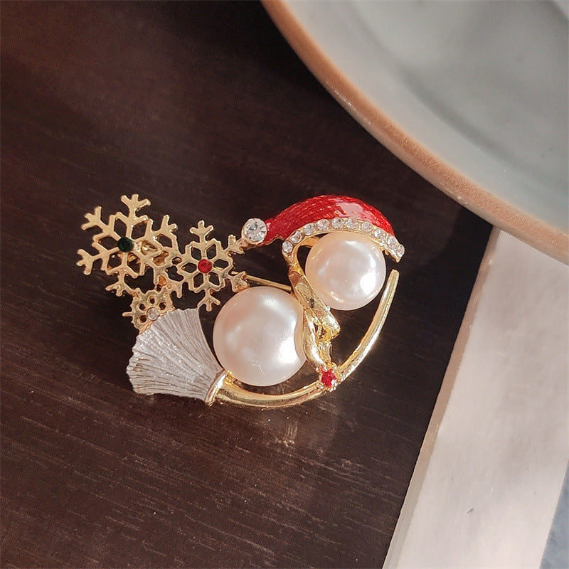 Cute Christmas Pearl Snowman Brooch on a sweater