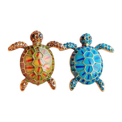 Enamel turtle brooch with vibrant blue design