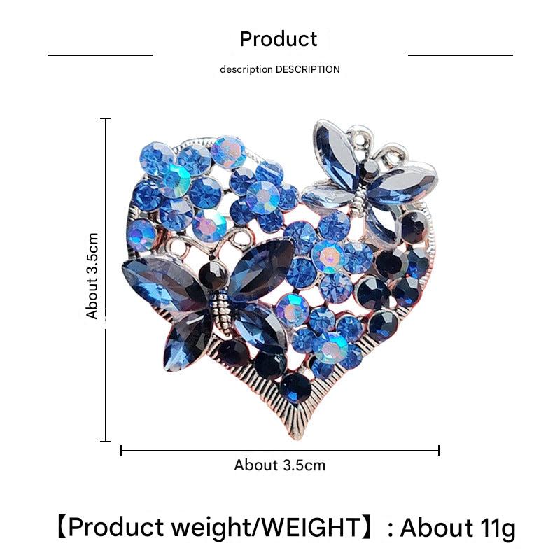 Butterfly Heart Brooch styled for a special event