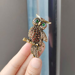 Luxury Diamond-Studded Blue Owl Brooch Pin displayed with elegance