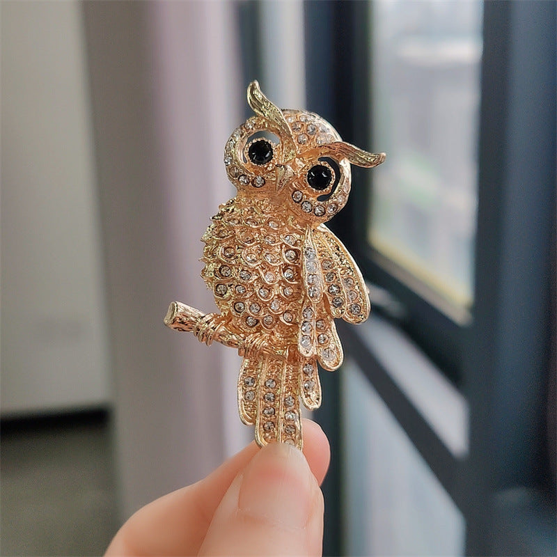 Detailed image of the diamond-studded owl accessory