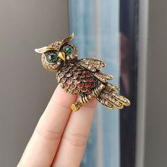 Artistic shot of the blue owl pin highlighting craftsmanship