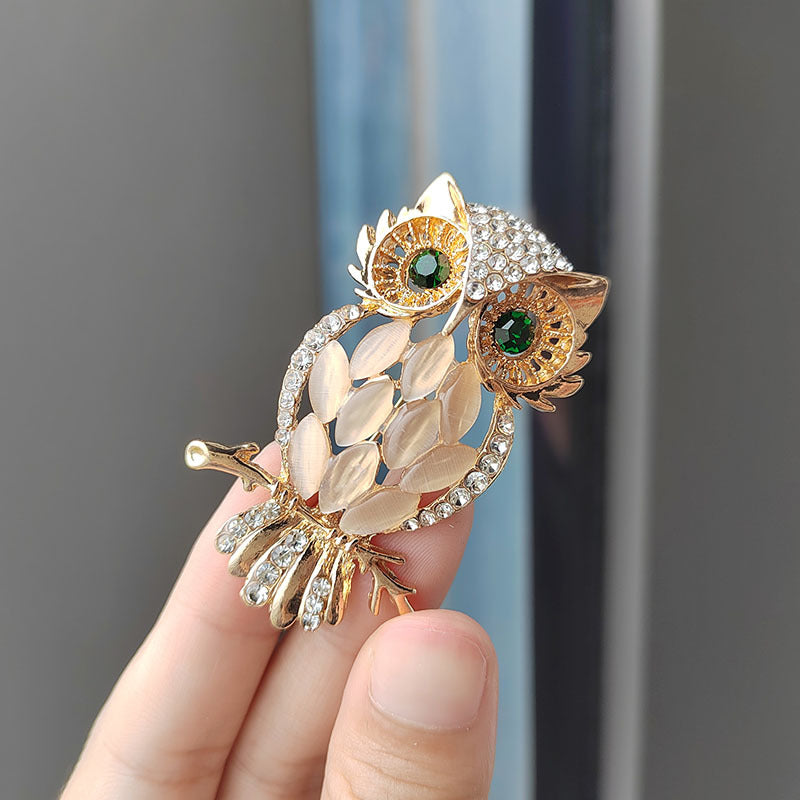 Stylish owl pin worn with attire