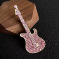 Close-up of rhinestone detail on guitar brooch