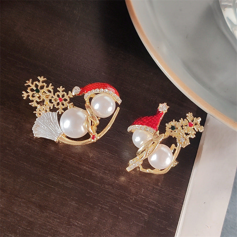 Cute snowman brooch with festive accents