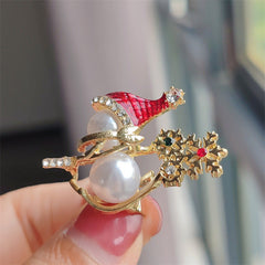 Cute snowman brooch with festive accents