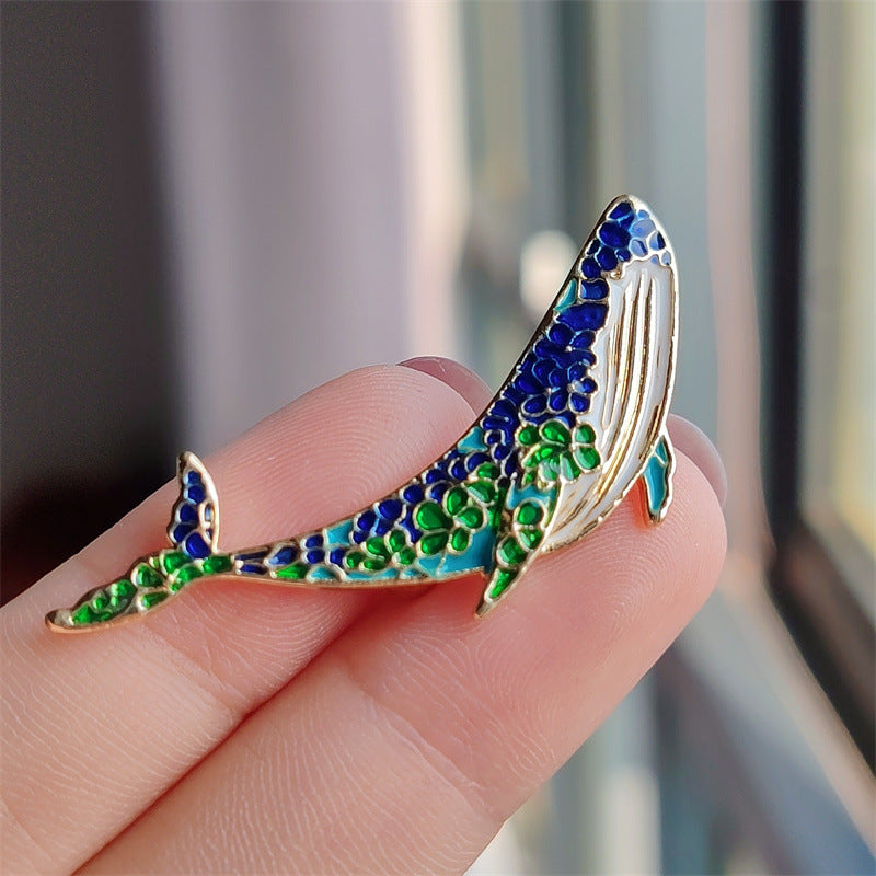 Stylish dolphin brooch with vibrant colours