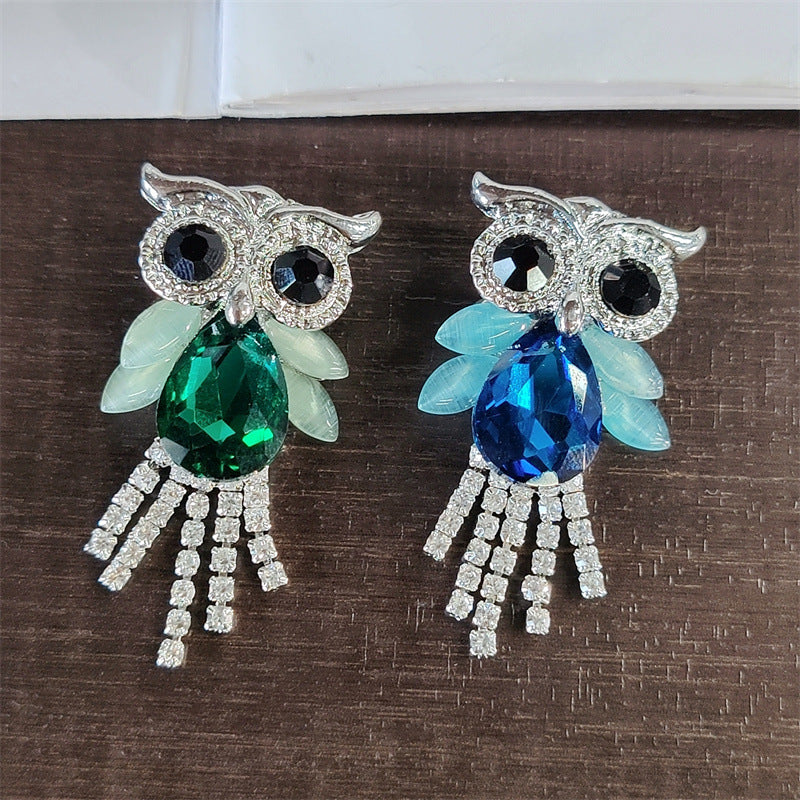 Stylish owl lapel pin on a jacket